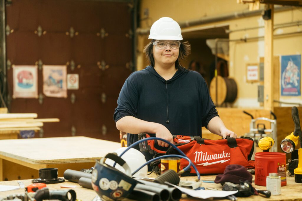 Intro To Construction Student with Tools