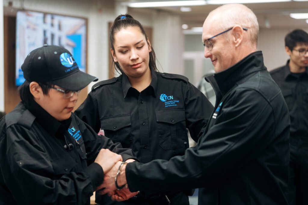 Law enforcement program teacher teaching students.