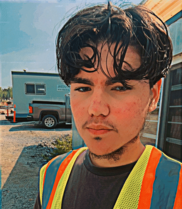 Aythan Mcleod in high vis vest.
